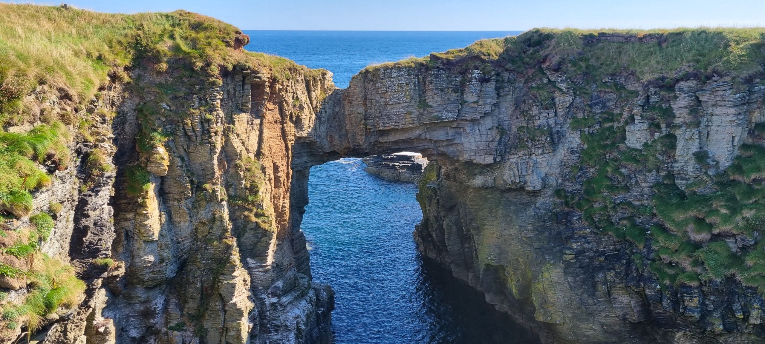 Sea arch at the Vat of Kirbister on Stronsay Looking out towards the impressive sea arch at the Vat of Kirbister on Stronsay