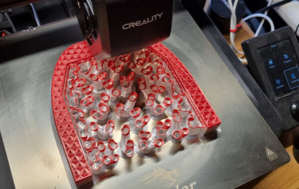 tree support of PLA print build plate picture of tree support of a PLA print on a creality printer