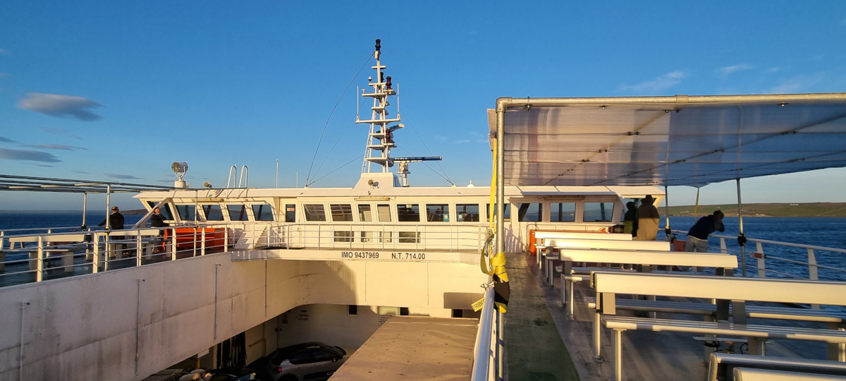 Sunset illuminating the rear of the bridge of the Pentalina crossing the Pentland Firth.