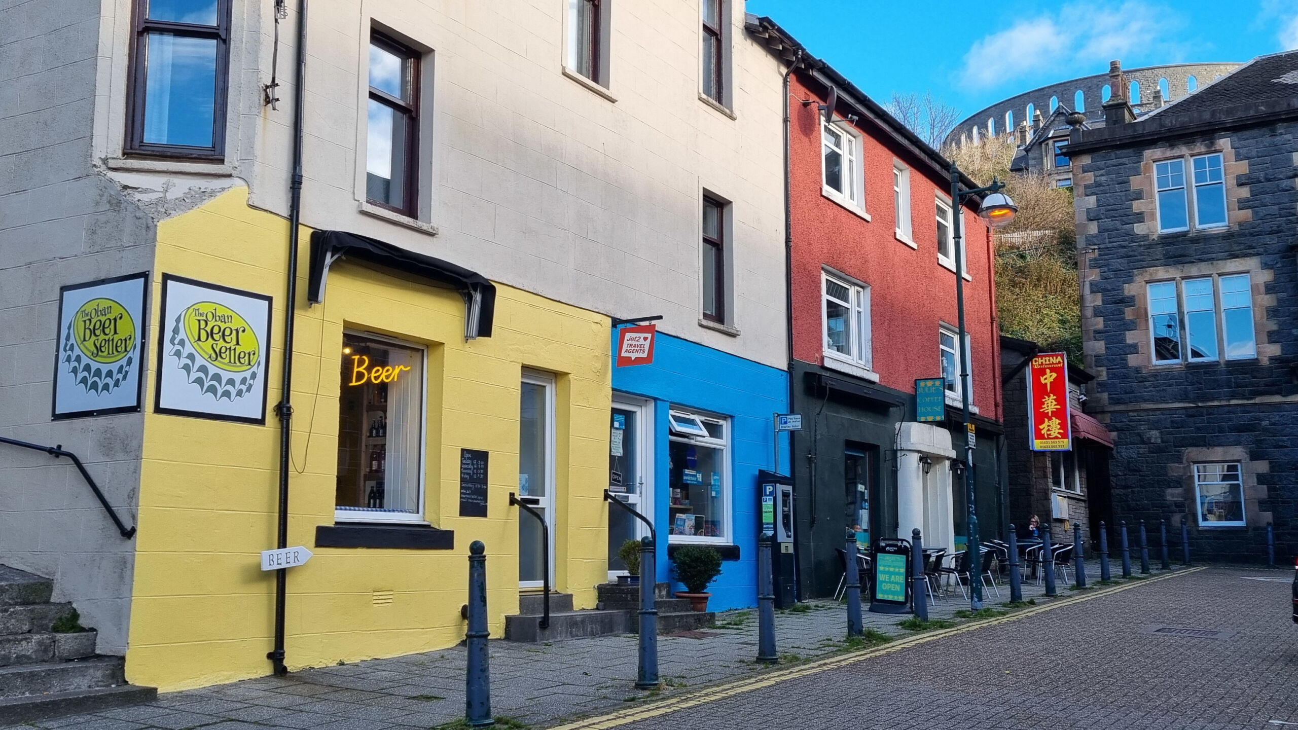 A close up of the outside of the Oban Beer Seller shop.